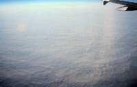 Nebelbogen im Wolkenmeer